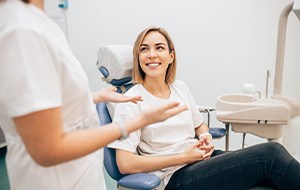 Woman talking to a dentist